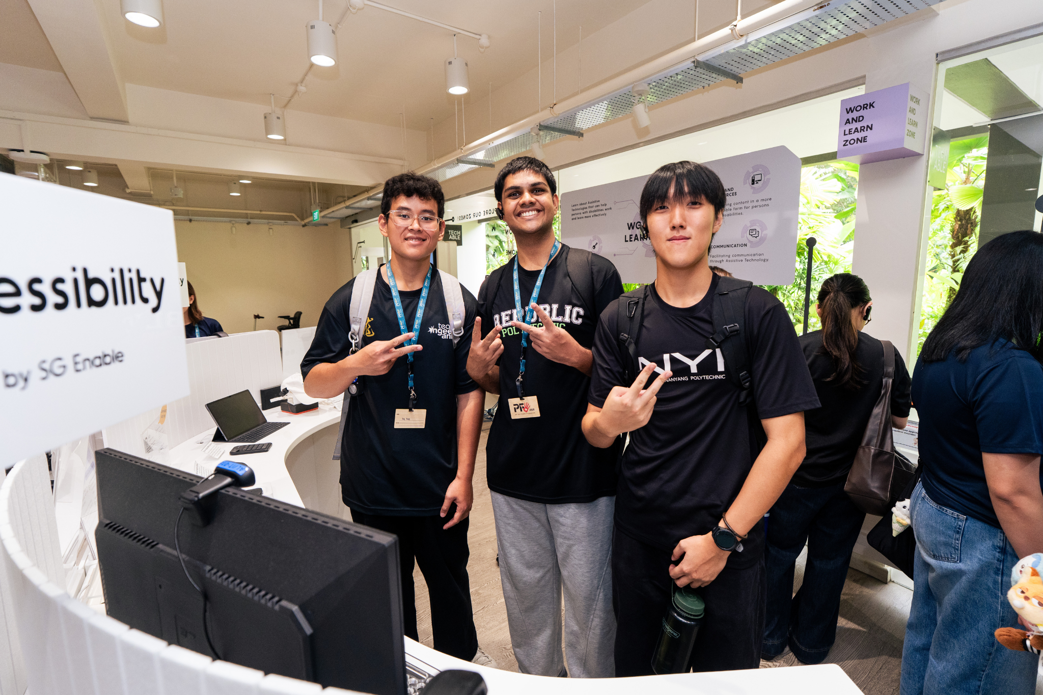 Student delegates pose for a photo during their learning journey at Enabling Village as part of Polytechnic Forum 2026.